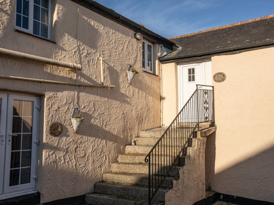 Granite steps leading up to Squirrels Drey Cottage